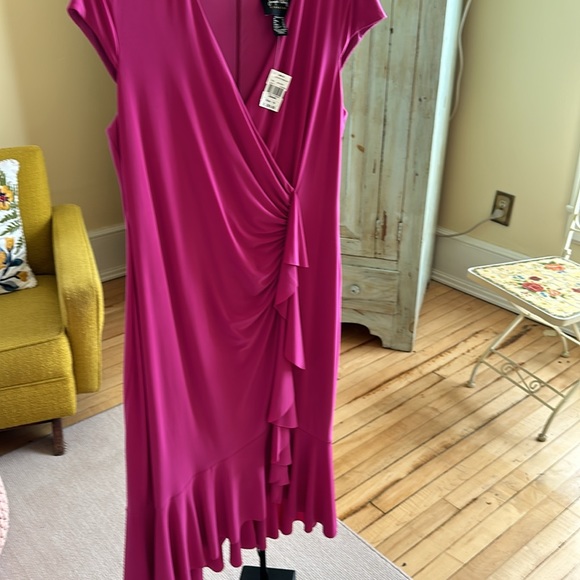 Dress hangs great. Never worn. Ruffles in front and bottom - Picture 6 of 9